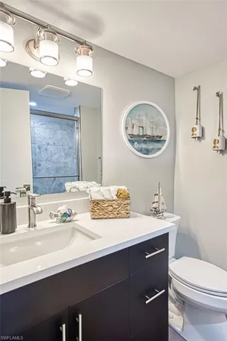 Full bathroom with a shower and vanity