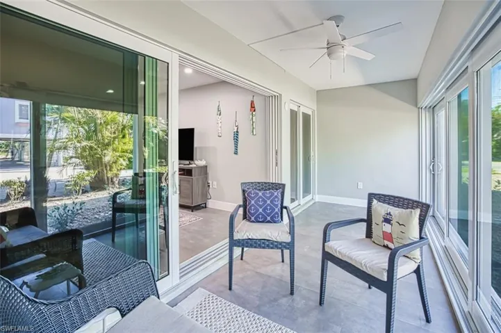 Glass enclosed lanai adding extra living space