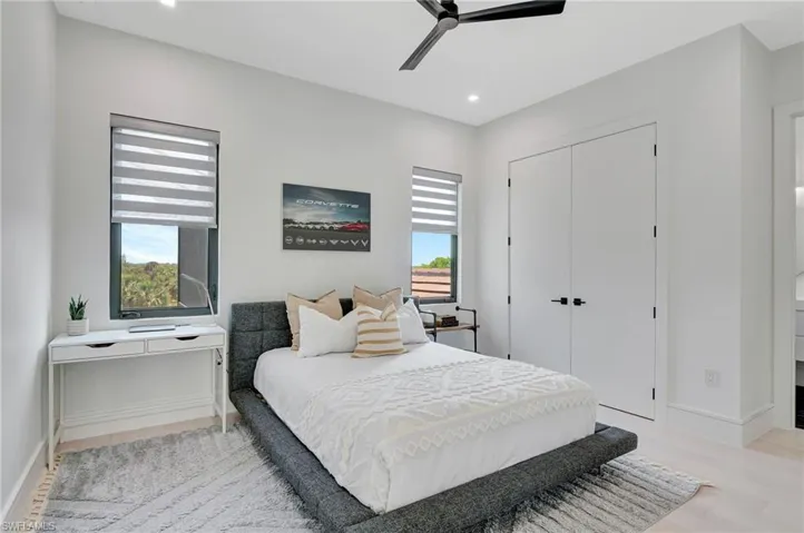 Bedroom featuring recessed lighting, a closet, baseboards, and ceiling fan