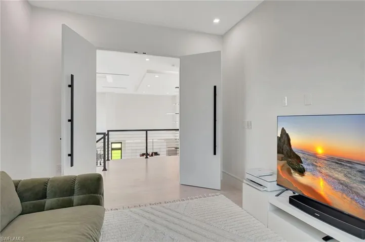 Living area featuring recessed lighting and wood finished floors
