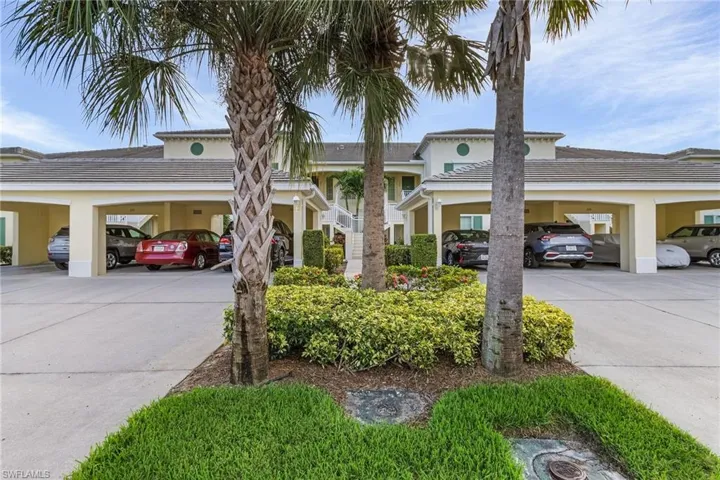 View of front of house featuring a carport