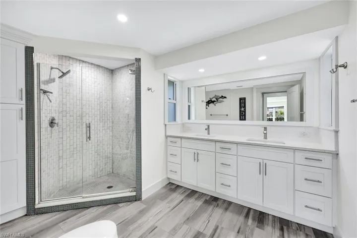 Primary bathroom offers plenty of room for two!
