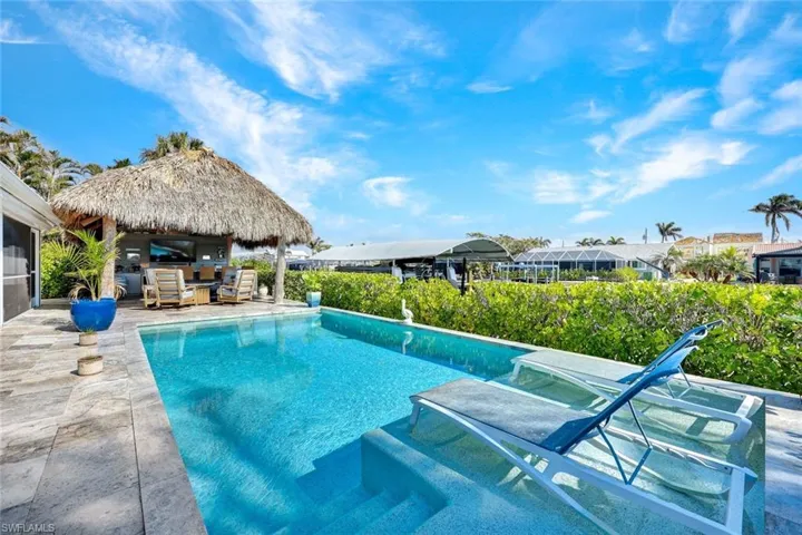 You will LOVE spending your Florida winters pool side AND canal side.