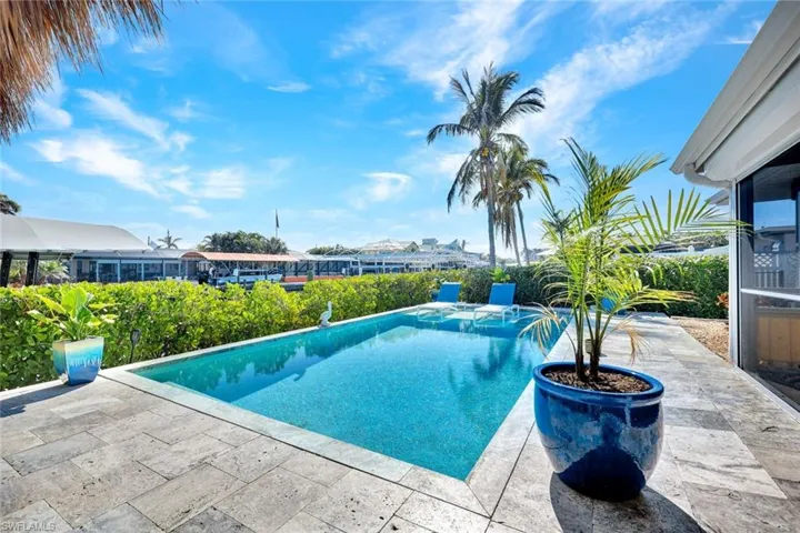 Spend lazy Florida days in this sunny spot overlooking the canal.