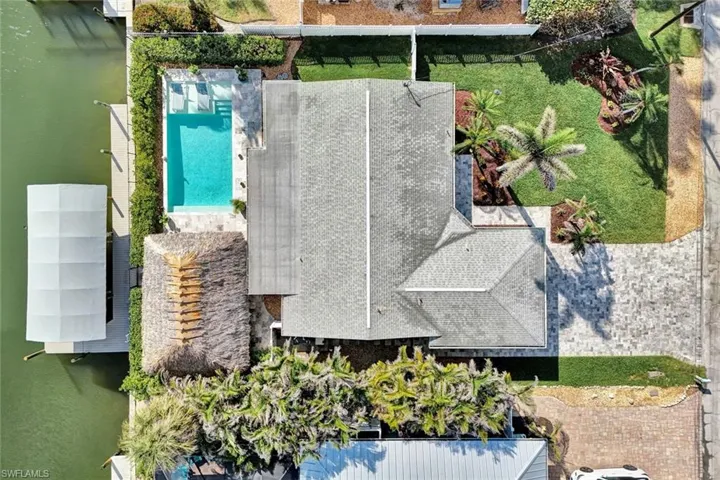LOOK NO FURTHER! Desirable, GULF ACCESS POOL HOME steps from Fort Myers Beach!