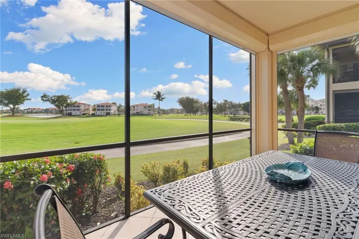 Sunroom / solarium with view of golf course