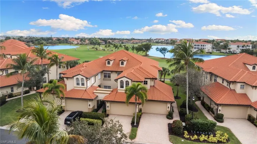 Aerial view of a nearby body of water and a golf course