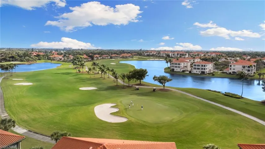Surrounding community featuring a water view and golf course view