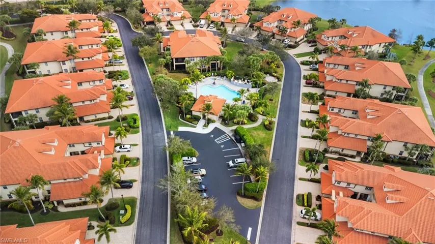 Aerial overview of property's location with nearby suburban area and a large body of water