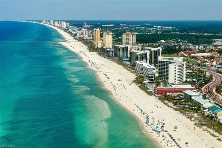 View of urban area with expansive beach