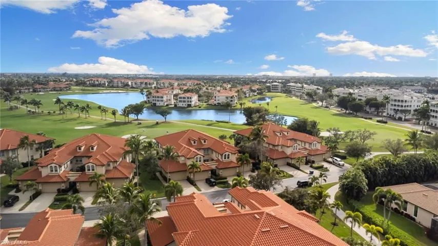 Bird's eye view of a nearby body of water and a golf club