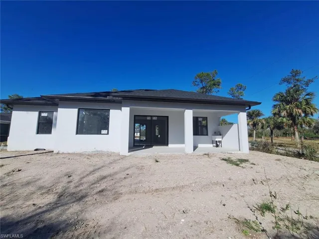 Rear view of house with a patio area