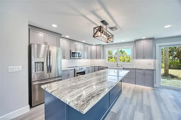 Stainless steel appliances and modern touches