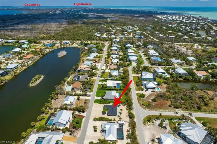 Bird's eye view with a residential view and a water view