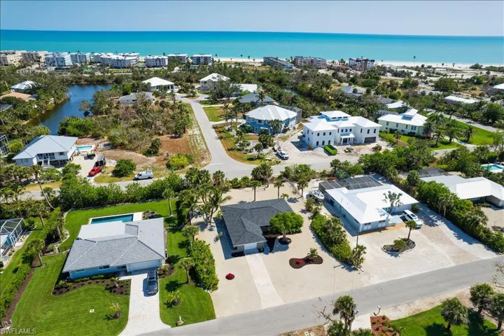 Aerial view with a water view and a residential view