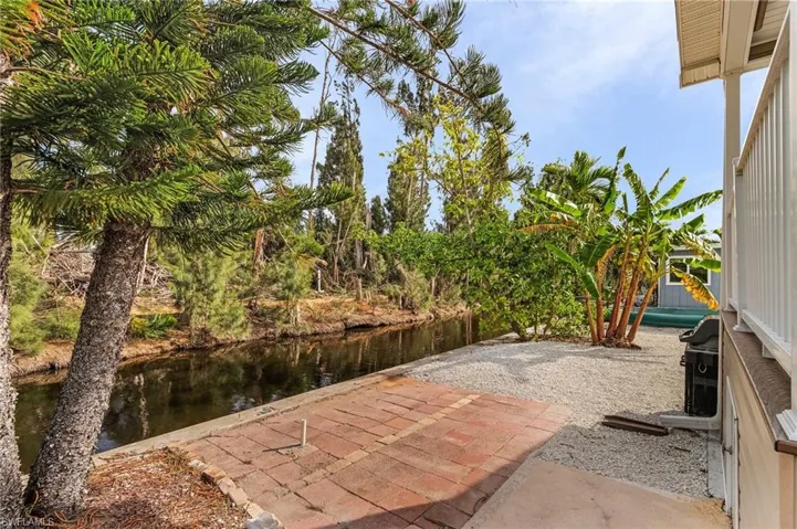 View of patio / terrace with a water view