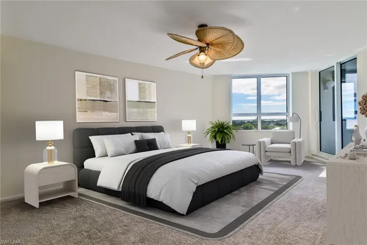 Primary Bedroom w/ Private Screened Balcony Access - Vitually Staged