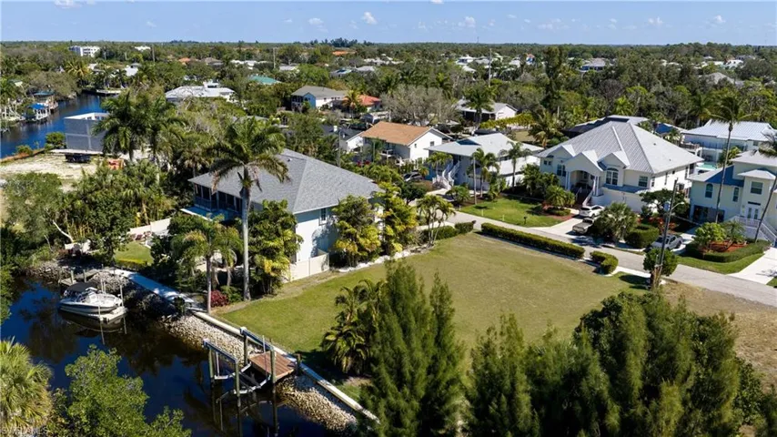 76 x 121 lot is on a peaceful & beloved street with prime West rear exposure for spectacular sunset views over the waterway & ideal sun on your future dream pool.