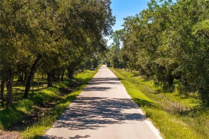 Paved Nine Mile Road leading to your tranquil oasis.
