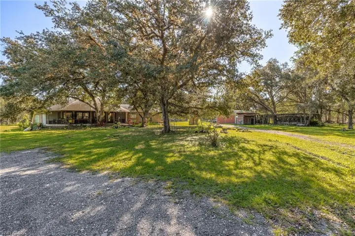 The home and barn are fenced off from the cows.