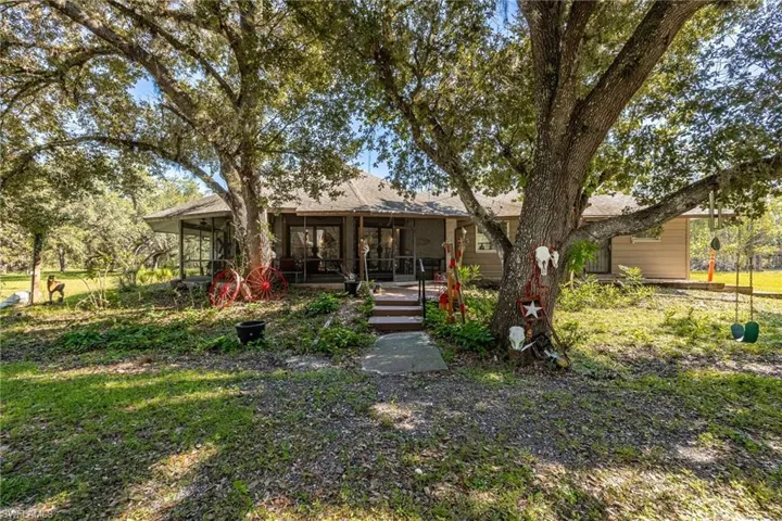The large screened porch is perfect for relaxing and watching what Mother Nature sends by.