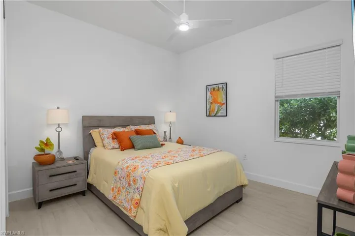 Guest bedroom #3 - All guest bedrooms all sit on the opposite side of the home from the primary, giving guests their own private space.