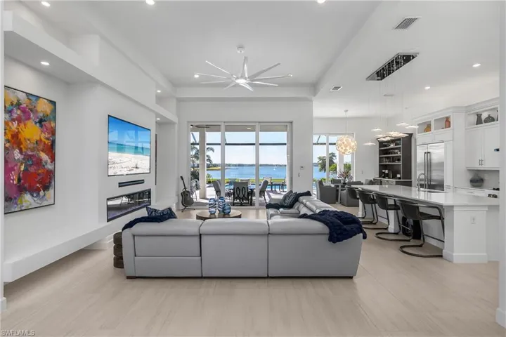 From the moment you enter this incredible home, you'll be struck by not only the incredible water views, but also the attention to detail and chic high-end finishes. This home needs to be EXPERIENCED, it is like no other in the community.