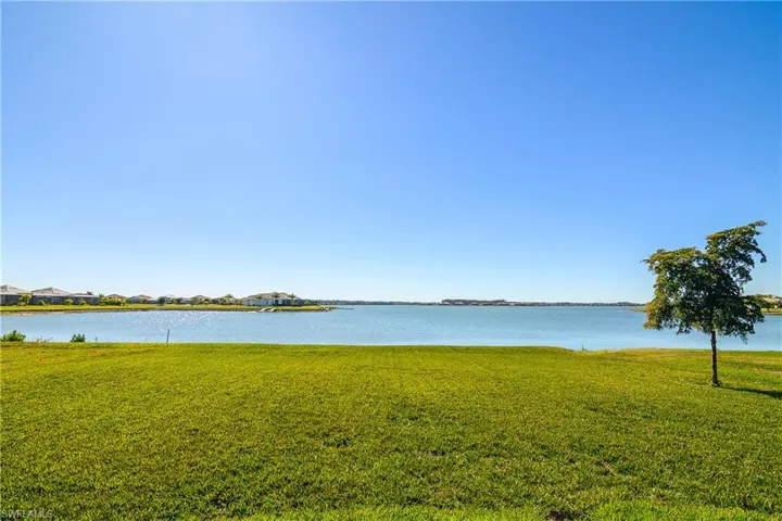 Oversized lot and the ability to add your own dock from this lakefront property.