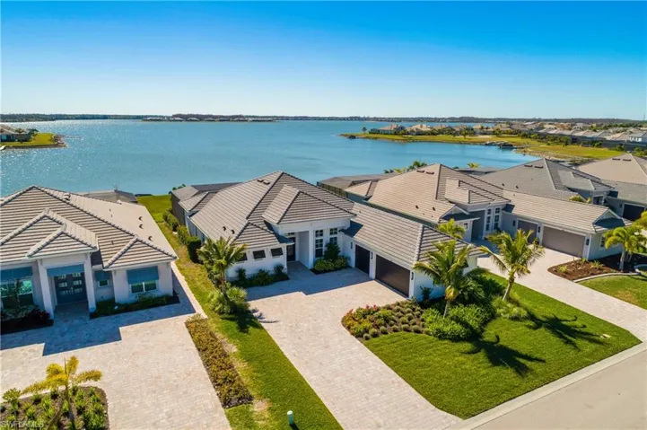 Welcome to this STUNNING, Lakefront, Southern Exposure WildBlue home, offering the BEST water view in the community!