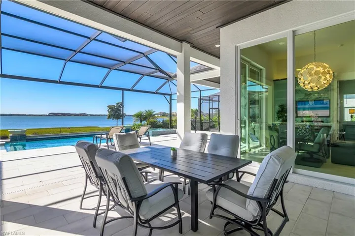 Enjoy lunch or dinner poolside with family and friends on your southern facing private lanai.