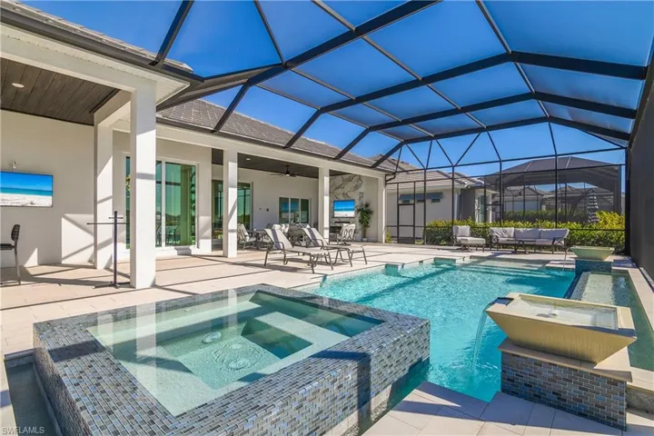 Relax and unwind in the spillover spa while taking in breathtaking lake views.