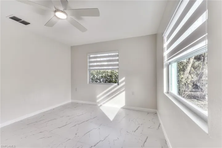 Spare room featuring ceiling fan