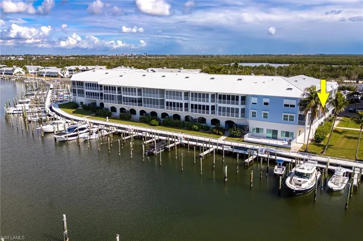 Bird's eye view of a nearby body of water and a marina