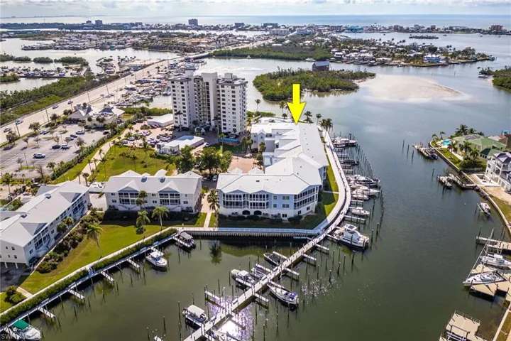Bird's eye view of a marina and a nearby body of water