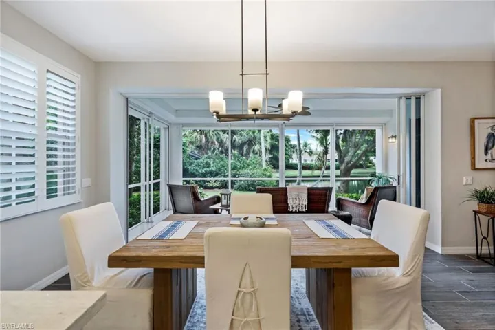 View looking from Dining Room through to Lanai and Lake views