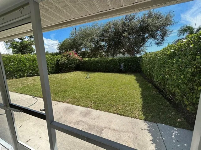 View of fenced backyard
