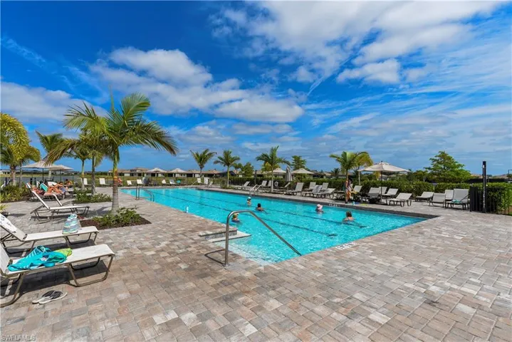 Community pool featuring a patio area