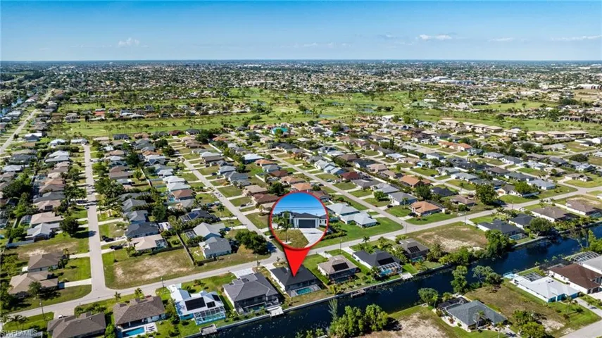View of property location featuring nearby suburban area and a large body of water