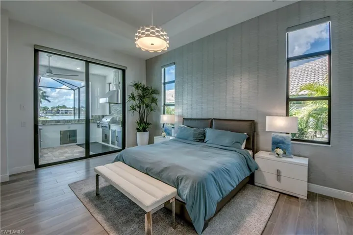 Bedroom with wood finish floors