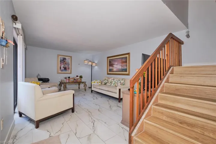 Living room with tile patterned floors