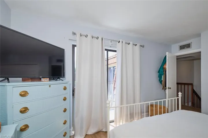 Bedroom featuring hardwood / wood-style flooring