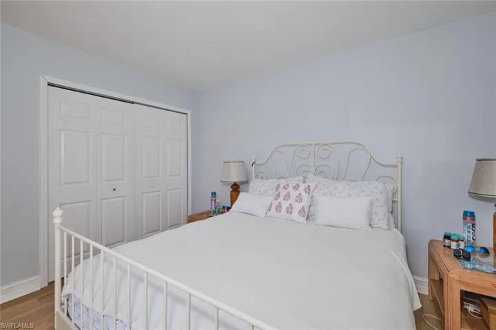 Bedroom featuring a closet and hardwood / wood-style floors
