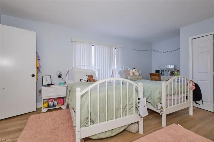 Bedroom with light wood-type flooring