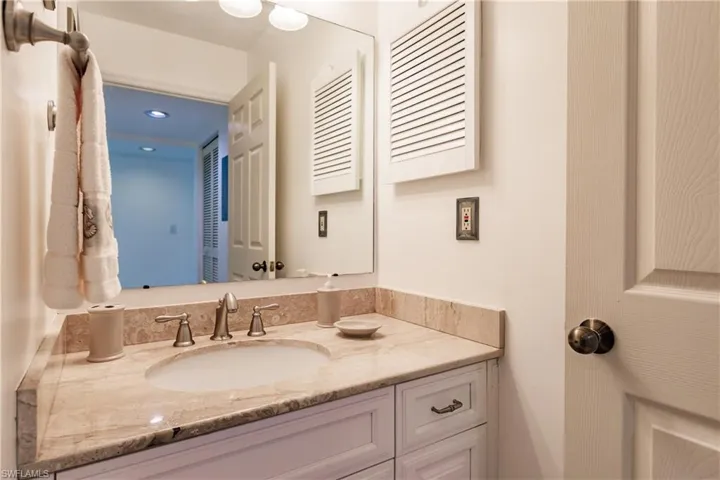 Bathroom featuring updated vanity & counter tops
