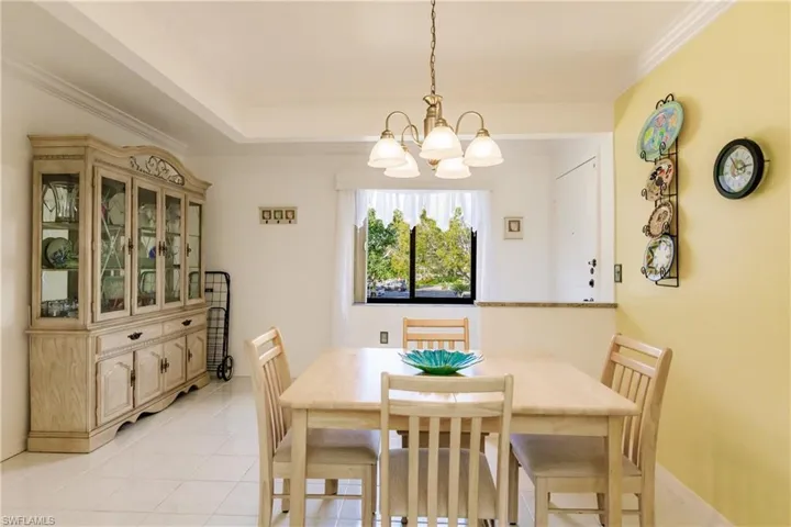 Dining room area with tile floor and lovely view