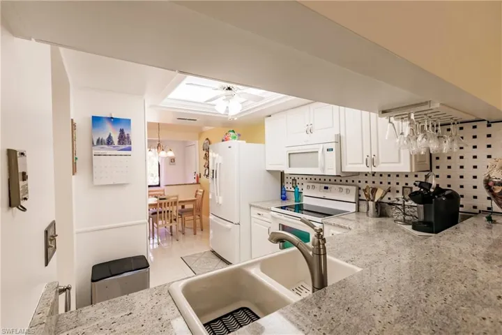 Kitchen featuring updated sink, faucet, Bosch dishwasher and appliances