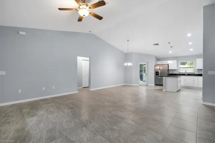 Open floor plan with vaulted ceilings