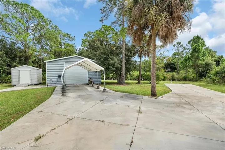 10X12 Storage Shed24X35 Steel BuildingAdditional paved parking