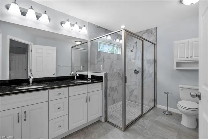 Master bath with custom shower and dual sinks