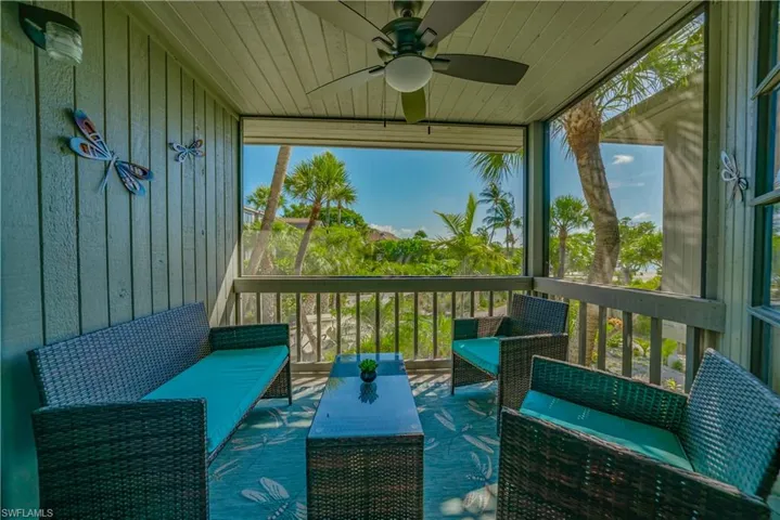 Screened Front Balcony overlooking Court Yard.